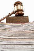 iStock_gavel on a stack of files