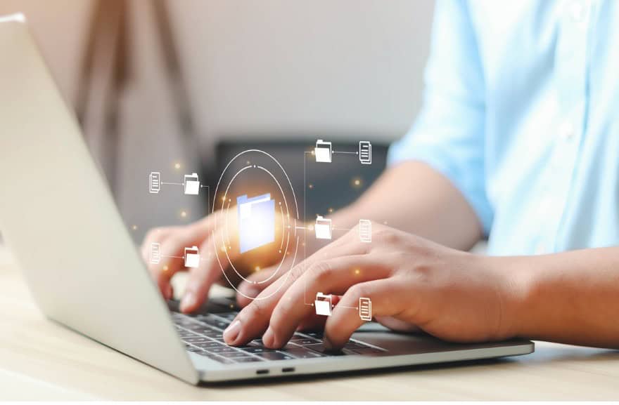 Person using laptop with digital security icons for legal e-filing.