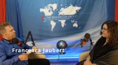 Bob Brewer and Francesca Jaubert discuss legal topics at Braumiller Law Group.